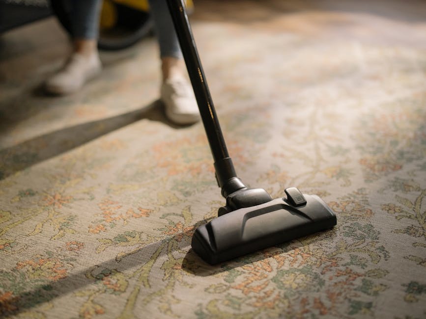 Vacuuming an area rug